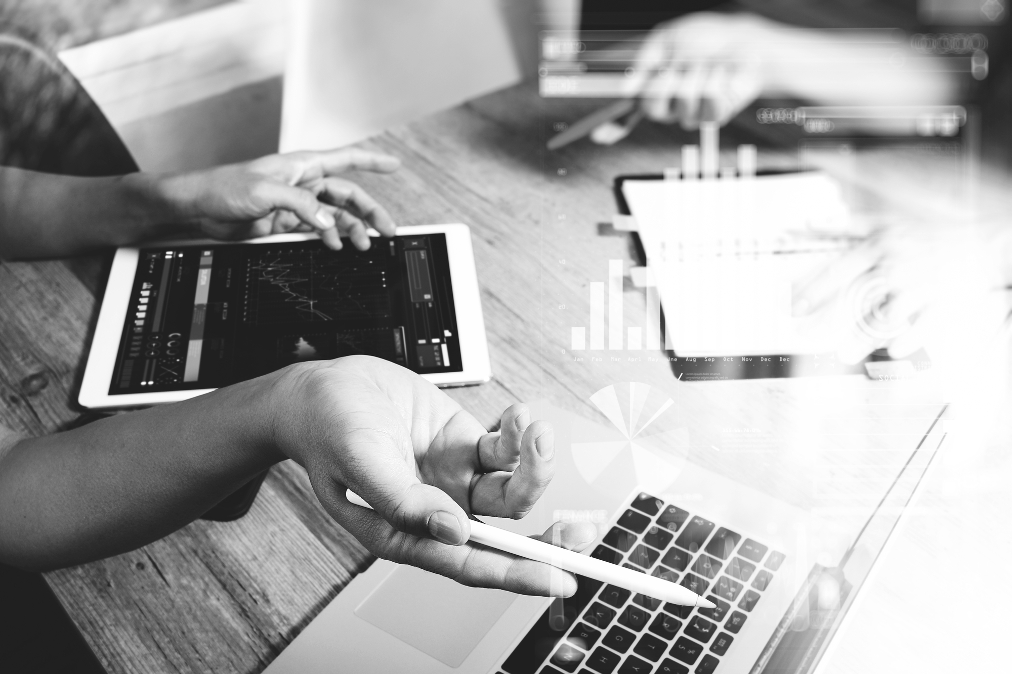 Business team meeting present. Photo professional investor working with new startup project. Finance managers meeting.Digital tablet laptop computer design smart phone using, black white