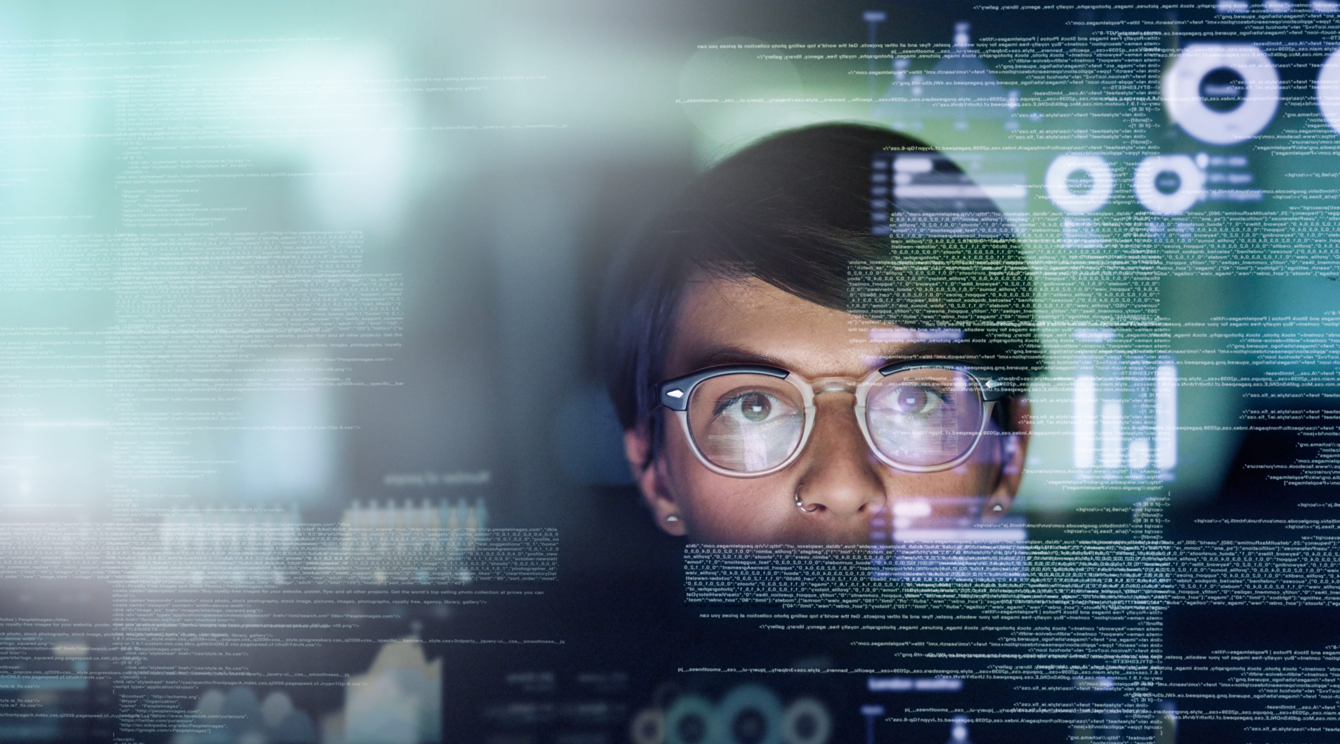 Cropped shot of a young computer programmer looking through data